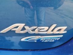 Photo of the vehicle Mazda Axela