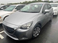 Photo of the vehicle Mazda Demio