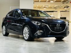 Photo of the vehicle Mazda Axela