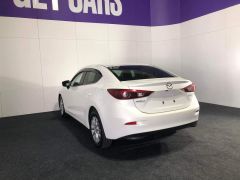 Photo of the vehicle Mazda Axela