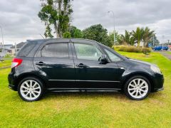 Photo of the vehicle Suzuki SX4