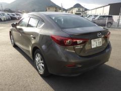 Photo of the vehicle Mazda Axela