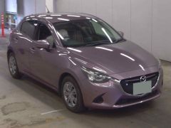 Photo of the vehicle Mazda Demio