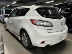 Photo of the vehicle Mazda Axela