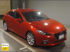 Photo of the vehicle Mazda Axela