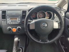 Photo of the vehicle Nissan Tiida