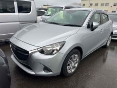 Photo of the vehicle Mazda Demio