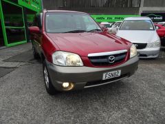 Photo of the vehicle Mazda Tribute