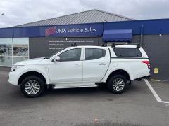 Photo of the vehicle Mitsubishi Triton