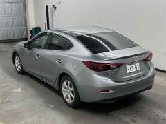 Photo of the vehicle Mazda Axela