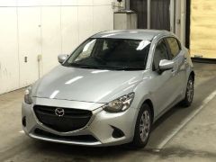 Photo of the vehicle Mazda Demio