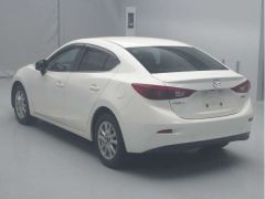 Photo of the vehicle Mazda Axela