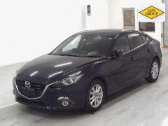 Photo of the vehicle Mazda Axela