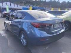 Photo of the vehicle Mazda Axela