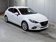 Photo of the vehicle Mazda Axela