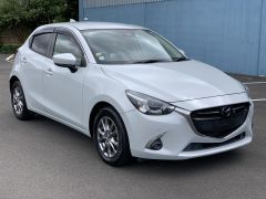 Photo of the vehicle Mazda Demio