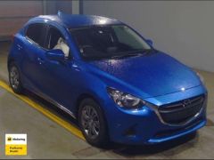 Photo of the vehicle Mazda Demio