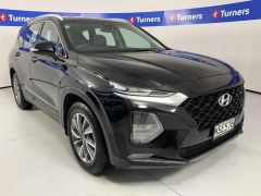 Photo of the vehicle Hyundai Santa Fe