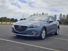 Photo of the vehicle Mazda Axela