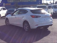 Photo of the vehicle Mazda Axela