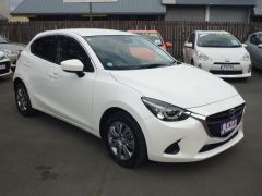 Photo of the vehicle Mazda Demio