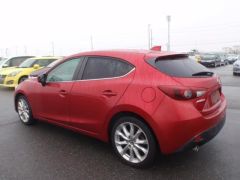 Photo of the vehicle Mazda Axela