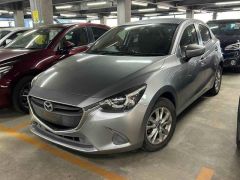 Photo of the vehicle Mazda Demio