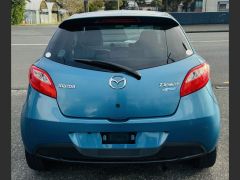 Photo of the vehicle Mazda Demio