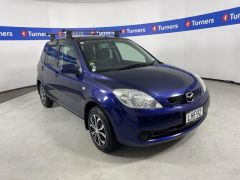 Photo of the vehicle Mazda Demio